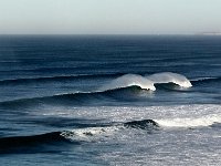 Twins   The amazing thing about the waves were their long plumes of sunlit spray.