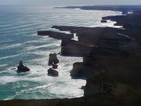 Afternoon Glare   The initial glare from the ocean as we took off was a mixed blessing.  It was difficult to see detail but the coastal shapes were impressive.