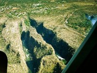 Batoka Gorge   The outflow travels through many miles of sharply zig-zagging gorge. Victoria Falls township is seen at the top.